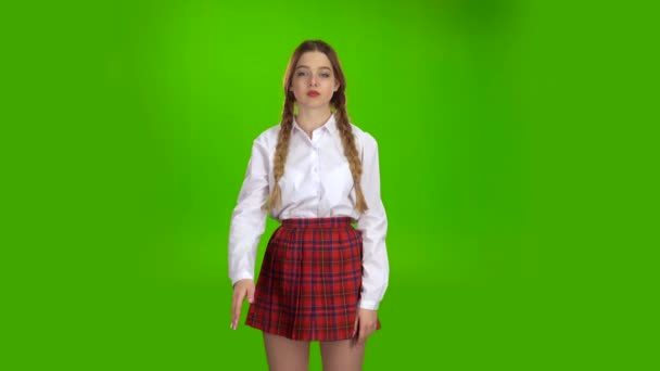 Student sends an air kiss. Green screen — Stock Video