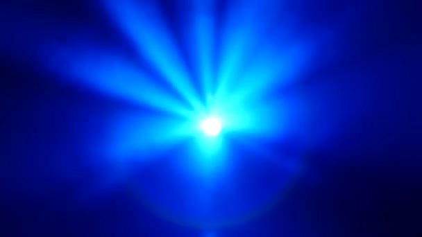 Background: Blue rays on a black background in smoke. Rays in the center — Stock Video