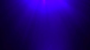 Işık ışınları ile mavi arka plan