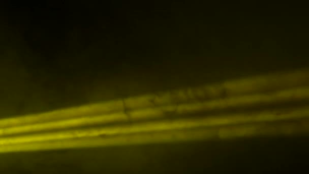 Fase spotlight met laser veelkleurige stralen en rook — Stockvideo
