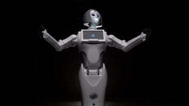 Robot çeşitli hareketler yapar. Siyah arka plan