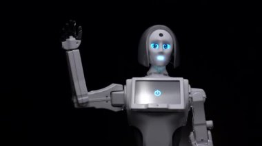 El Merhaba sallayarak bir robot. Siyah arka plan