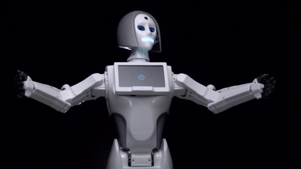 Robot parla e fa gesti con le proprie mani. Fondo nero — Video Stock