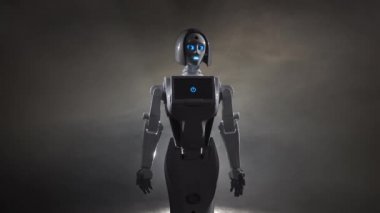 Robot çeşitli hareketler yapar. Siyah duman arka plan