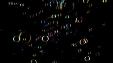 Orta sabun köpüğü iplik. Siyah arka plan.