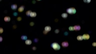 Soyut ışıklar bokeh sinek. Siyah arka planlar