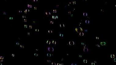 Orta sabun köpüğü iplik. Siyah arka plan.