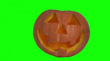 Cadılar Bayramı Balkabağı yeşil bir ekran üzerinde korkunç bir yüz ile