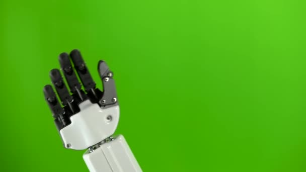 Mão de um robô fechar-se acenando oi. Tela verde — Vídeo de Stock
