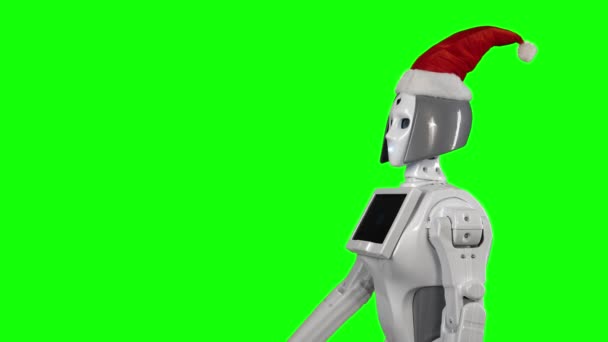 Robot con un sombrero de Santa Claus está pidiendo un gesto de mano. Pantalla verde. Vista lateral — Vídeo de stock