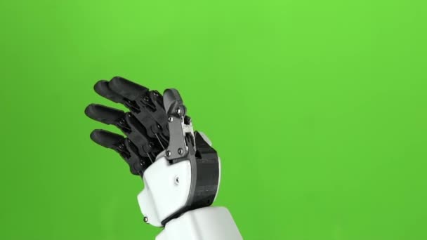 Robot hand close-up hallo zwaaien. Groen scherm. Slow motion — Stockvideo