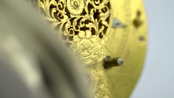 Gears the mechanism of a vintage pocket watch. Close up . Sound — Stock Video