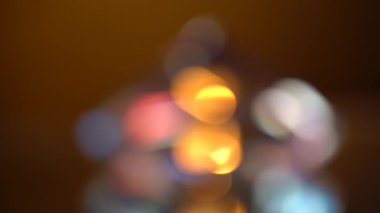 Kırmızı, mavi ve turuncu ışıklar bokeh soyut. Siyah arka plan