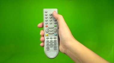 Uzaktan kumanda televizyon değişen bir kanal gri. Yeşil ekran
