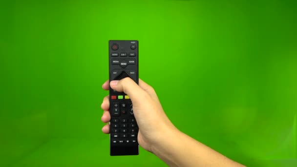 Setting up programs using the remote control. Green screen — Stock Video