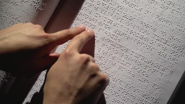 Braille blind reading in evening. Close up — Stock Video