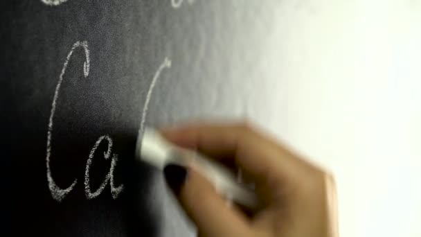 Chemistry elements in formula written on blackboard. Close up — Stock Video
