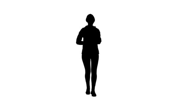 Meisje loopt verhoogt haar handen omhoog. Witte achtergrond. Silhouet — Stockvideo