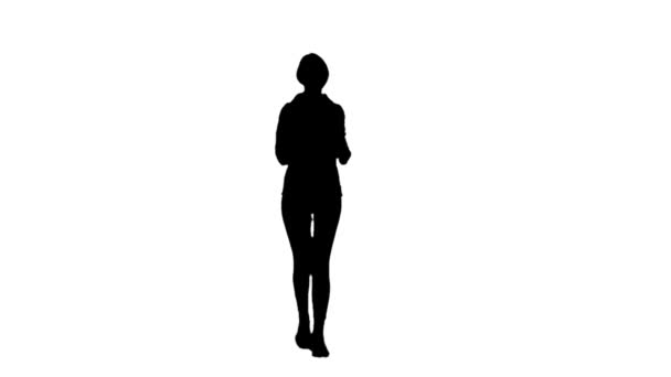 Meisje loopt en heft haar handen op. Witte achtergrond. Slow Motion. Silhouet — Stockvideo