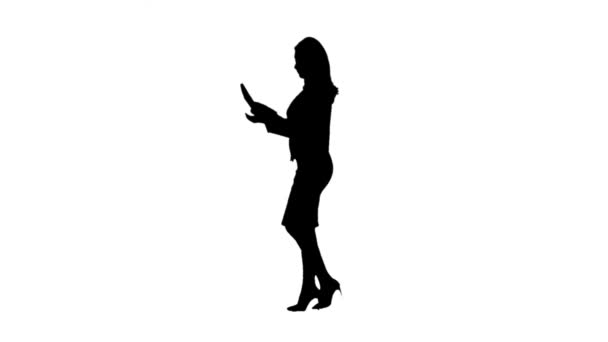 Girl with documents in their hands and walks . Side view. White background. Silhouette. Slow motion — Αρχείο Βίντεο