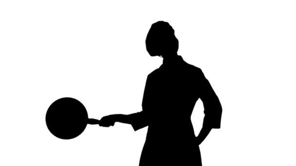 Black silhouette of chef woman is posing with a stewpot. — Stock Video