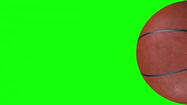 Yavaş çekimde dönen dokulu basketbol topunun 3d animasyonu.