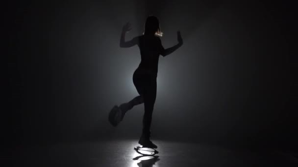 Woman doing exercises in kangoo jumps shoes at studio — Stock Video