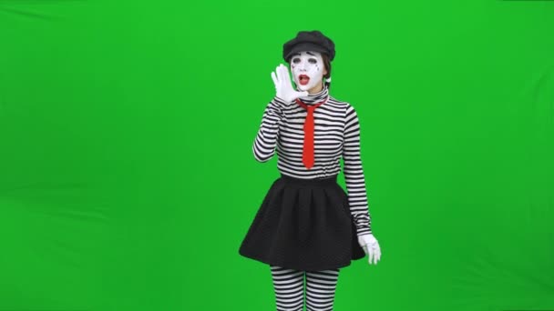 Mime vrouw met professionele make-up belt iemand. Chromatoetsen. — Stockvideo