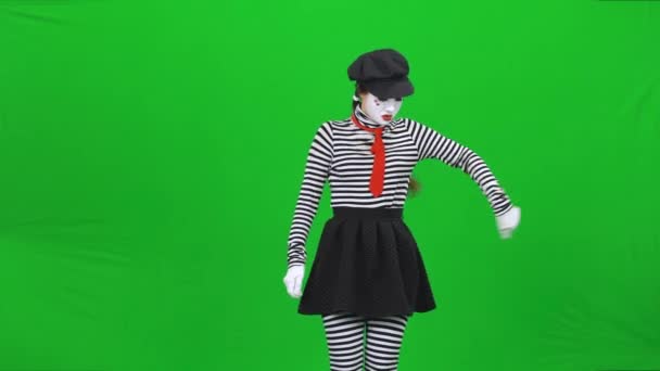 Mime girl is driving a car. Green screen, Chroma key. — Stock Video