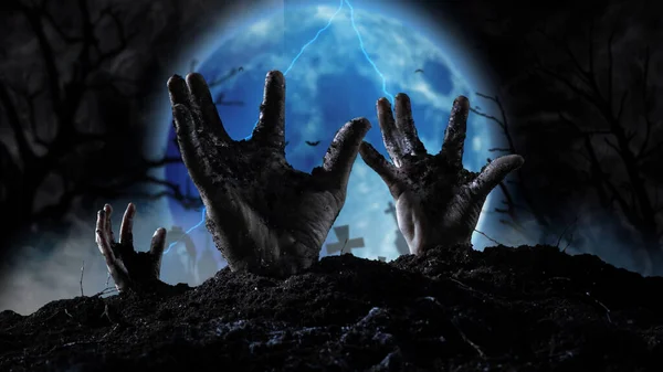 Zombie-hånd stiger ut av en grav royaltyfrie gratis stockbilder