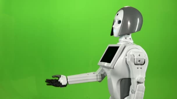 Robot un gesto de mano llama a sí mismo y habla. Pantalla verde. Vista lateral. Movimiento lento — Vídeo de stock