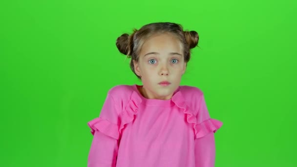 Child is surprised from what he saw. Green screen. Slow motion — Stock Video