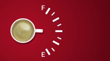 Yakıt göstergesi, kırmızı arka planda kahve ile yakıt seviyesini gösteriyor. Kahve yaratıcı fikir geçmişi.