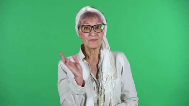 Portrait of old stylish woman is indignant pointing herself innocent, saying who me, no. Chroma key. — Stock Video