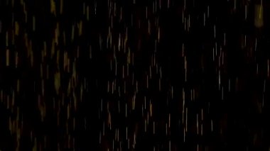 Sarı ışık parıltısıyla püskürt. Yaklaş. Siyah arka plan, stüdyo. Kapatın. Yavaş çekim.