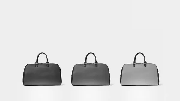 Grupp av tre fashionabla grå läder bowling väskor — Stockfoto