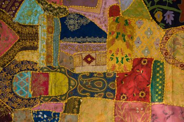 Top view of Indian patchwork carpet in the city of Manali, Himachal Pradesh, India  clipart