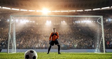 Kaleci profesyonel futbol stadyumu bir atlama bir hedefi kaydetmek çalışıyor. Stadyum ve kalabalık 3d yapılır.