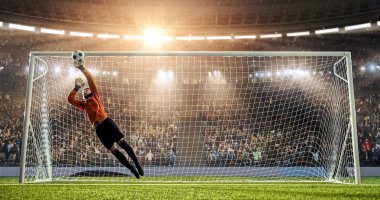 Kaleci profesyonel futbol stadyumu bir atlama bir hedefi kaydetmek çalışıyor. Stadyum ve kalabalık 3d yapılır.