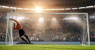 Kaleci profesyonel futbol stadyumu bir atlama bir hedefi kaydetmek çalışıyor. Stadyum ve kalabalık 3d yapılır.