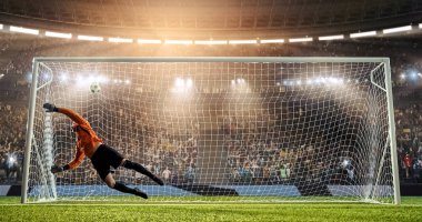 Kaleci profesyonel futbol stadyumu bir atlama bir hedefi kaydetmek çalışıyor. Stadyum ve kalabalık 3d yapılır.