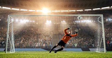 Kaleci profesyonel futbol stadyumu bir atlama bir hedefi kaydetmek çalışıyor. Stadyum ve kalabalık 3d yapılır.