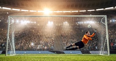 Kaleci profesyonel futbol stadyumu bir atlama bir hedefi kaydetmek çalışıyor. Stadyum ve kalabalık 3d yapılır.