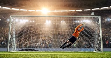 Kaleci profesyonel futbol stadyumu bir atlama bir hedefi kaydetmek çalışıyor. Stadyum ve kalabalık 3d yapılır.