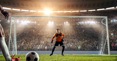 Futbolcu kaleci bir profesyonel futbol stadyumu savunur iken bir gol çalışıyor. Stadyum ve kalabalık 3d yapılır.