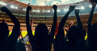 Grup hayranları tezahürat tarihinde stadyum spor şampiyonluk dikkat et. Onların takım kazandı ve herkes bu olayı kutluyoruz. İnsanlar rahat bir beze giyindin.