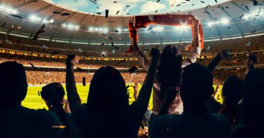 Grup hayranları tezahürat tarihinde stadyum spor şampiyonluk dikkat et. Onların takım kazandı ve herkes bu olayı kutluyoruz. İnsanlar rahat bir beze giyindin.