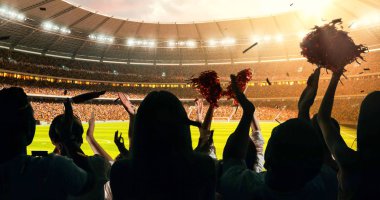 Grup hayranları tezahürat tarihinde stadyum spor şampiyonluk dikkat et. Onların takım kazandı ve herkes bu olayı kutluyoruz. İnsanlar rahat bir beze giyindin.