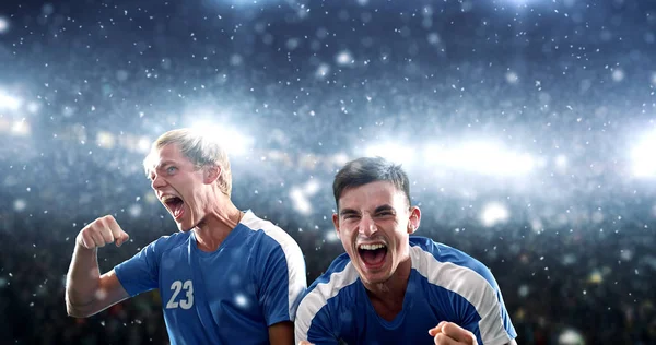 Jogadores Futebol Estão Comemorando Uma Vitória Estádio Profissional Enquanto Neva — Fotografia de Stock