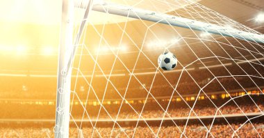 Fotoğraf güneş parlar süre profesyonel futbol stadyumu bir hedef haline uçar top. Stadyum ve kalabalık 3d yapılır.